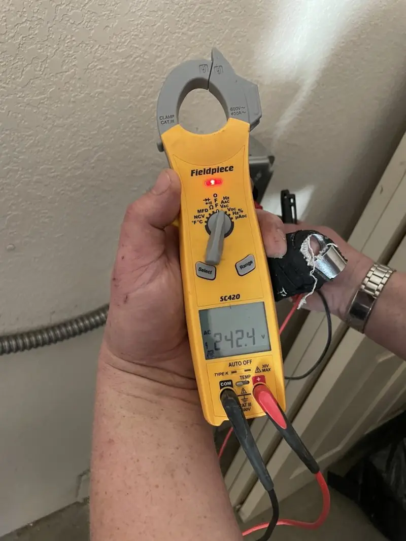 Voltage testing with clamp meter during Generator Installation in Harahan